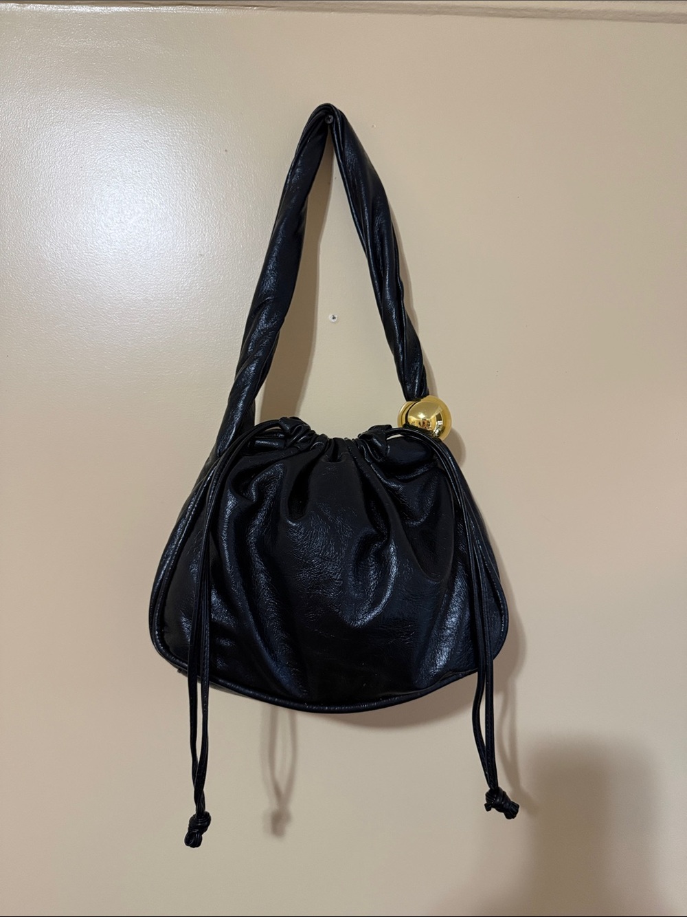 Zara Black Drawstring Shoulder Bag with Gold Sphere Accent